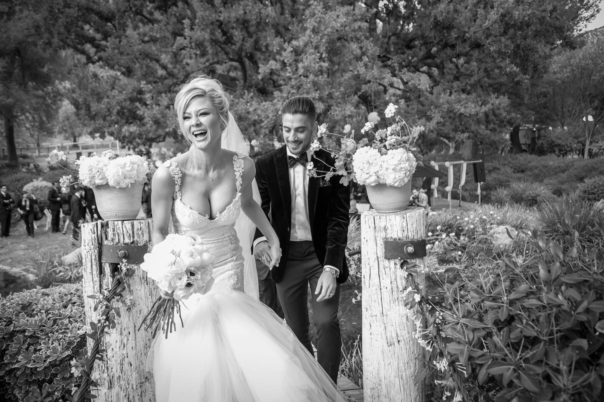Abbi Cooperman in Galia Lahav Suzanne with her husband