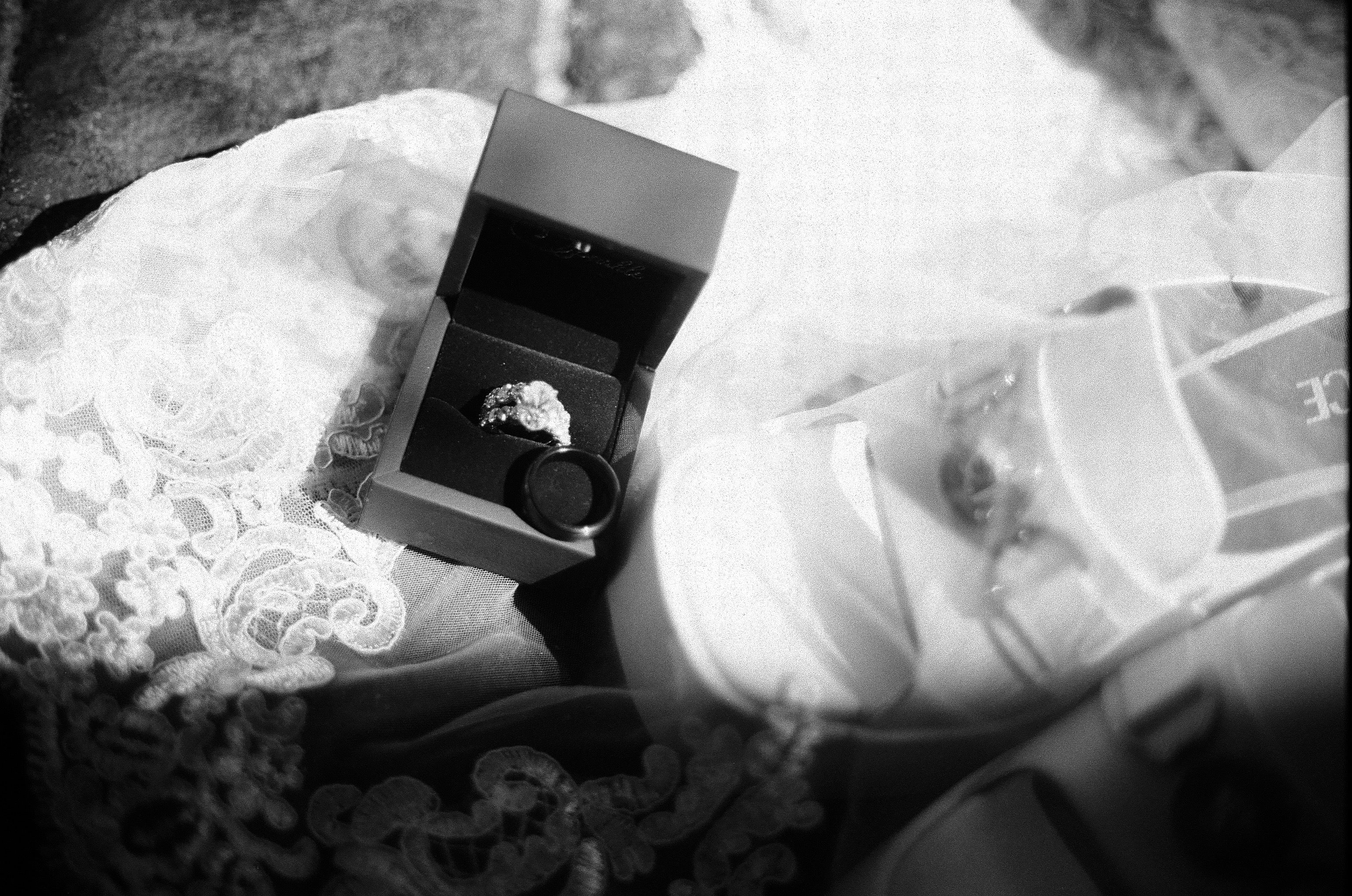 Black box with a ring on a textured surface