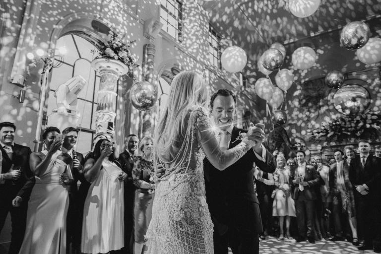 GL Bride Charlotte wearing our Rhiannon dancing with her husband