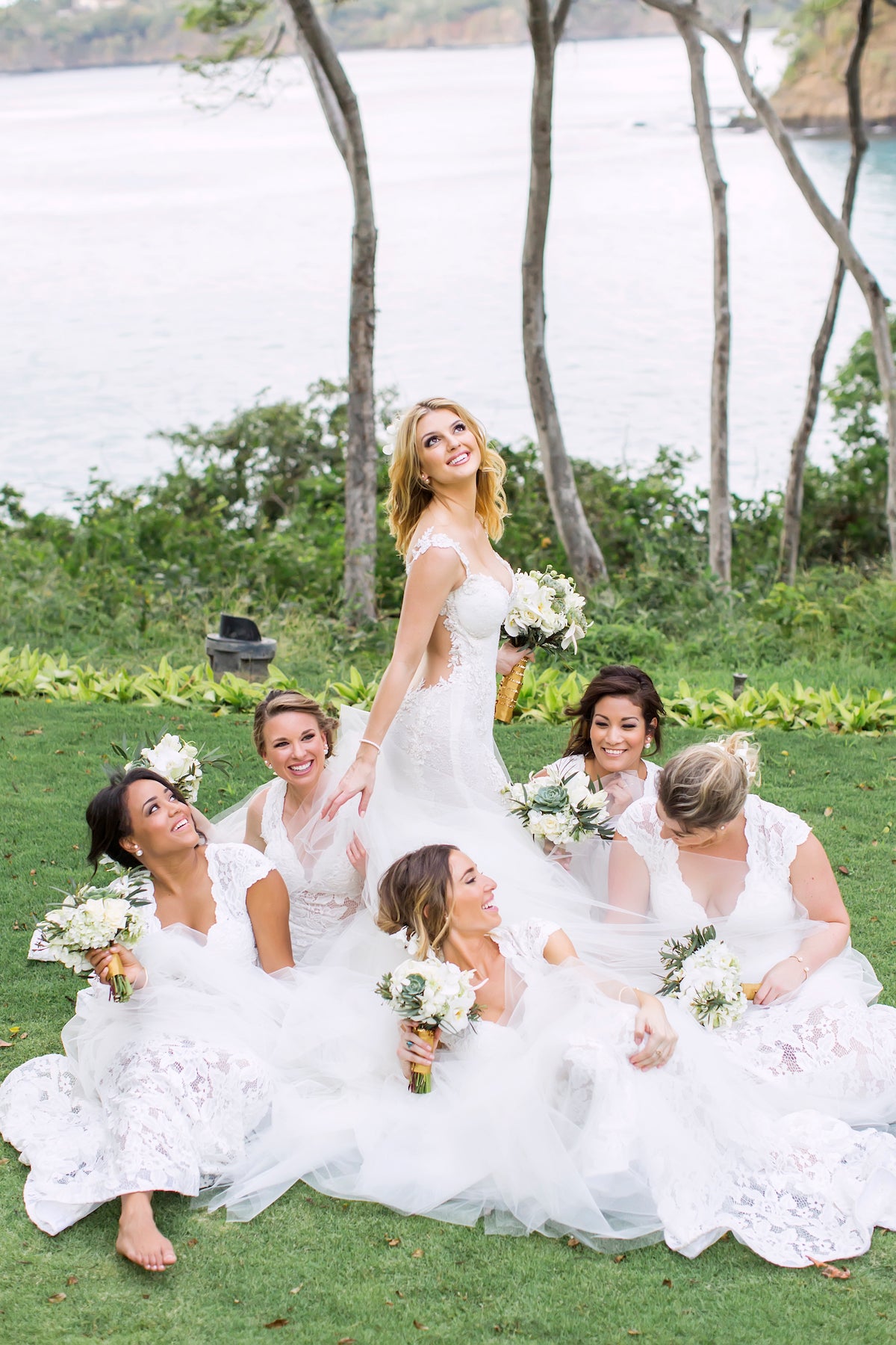 GL Bride Allie wearing our Loretta gown with her bridesmaids
