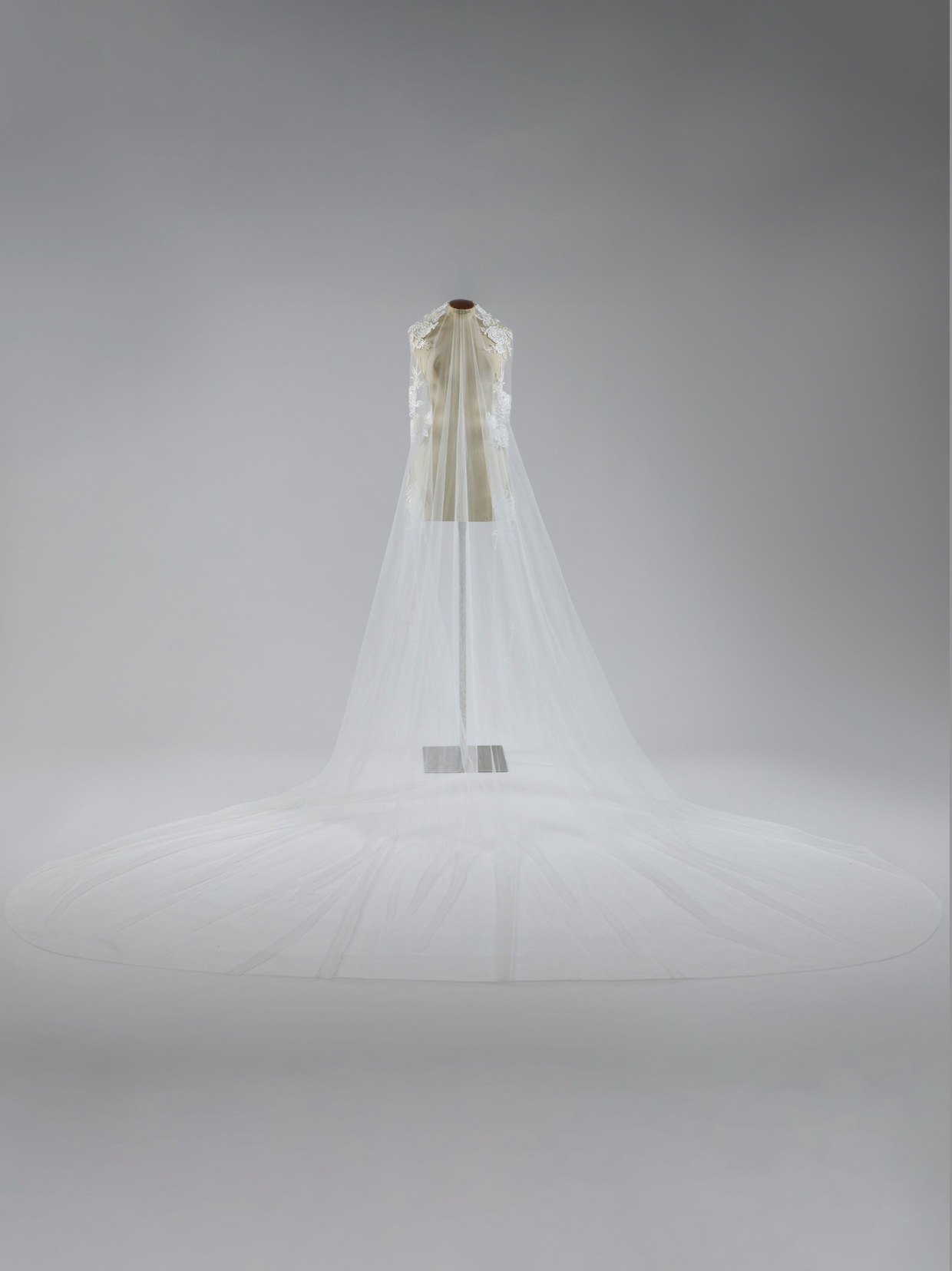 White wedding veil on a gray background