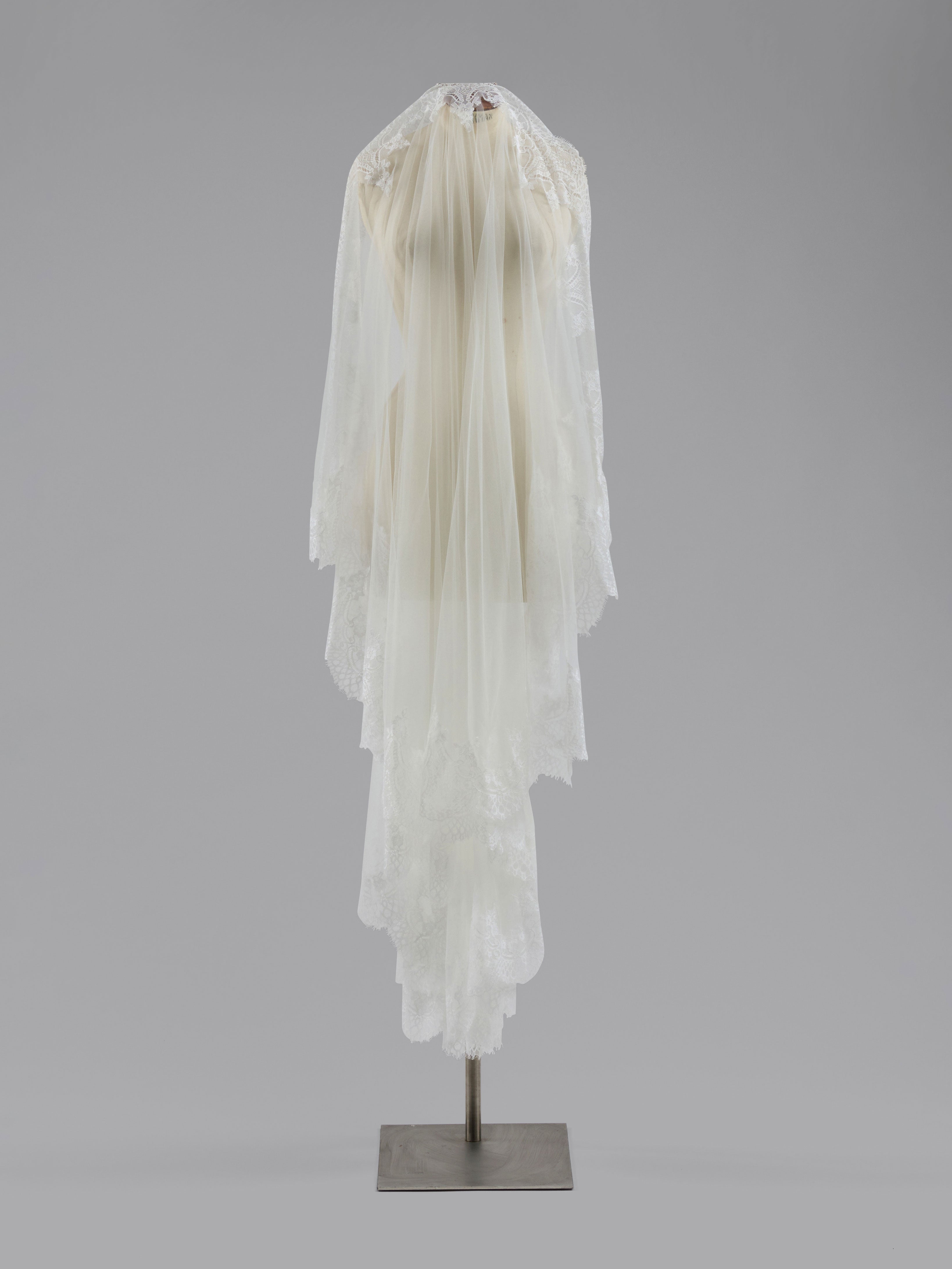 White wedding veil on a gray background