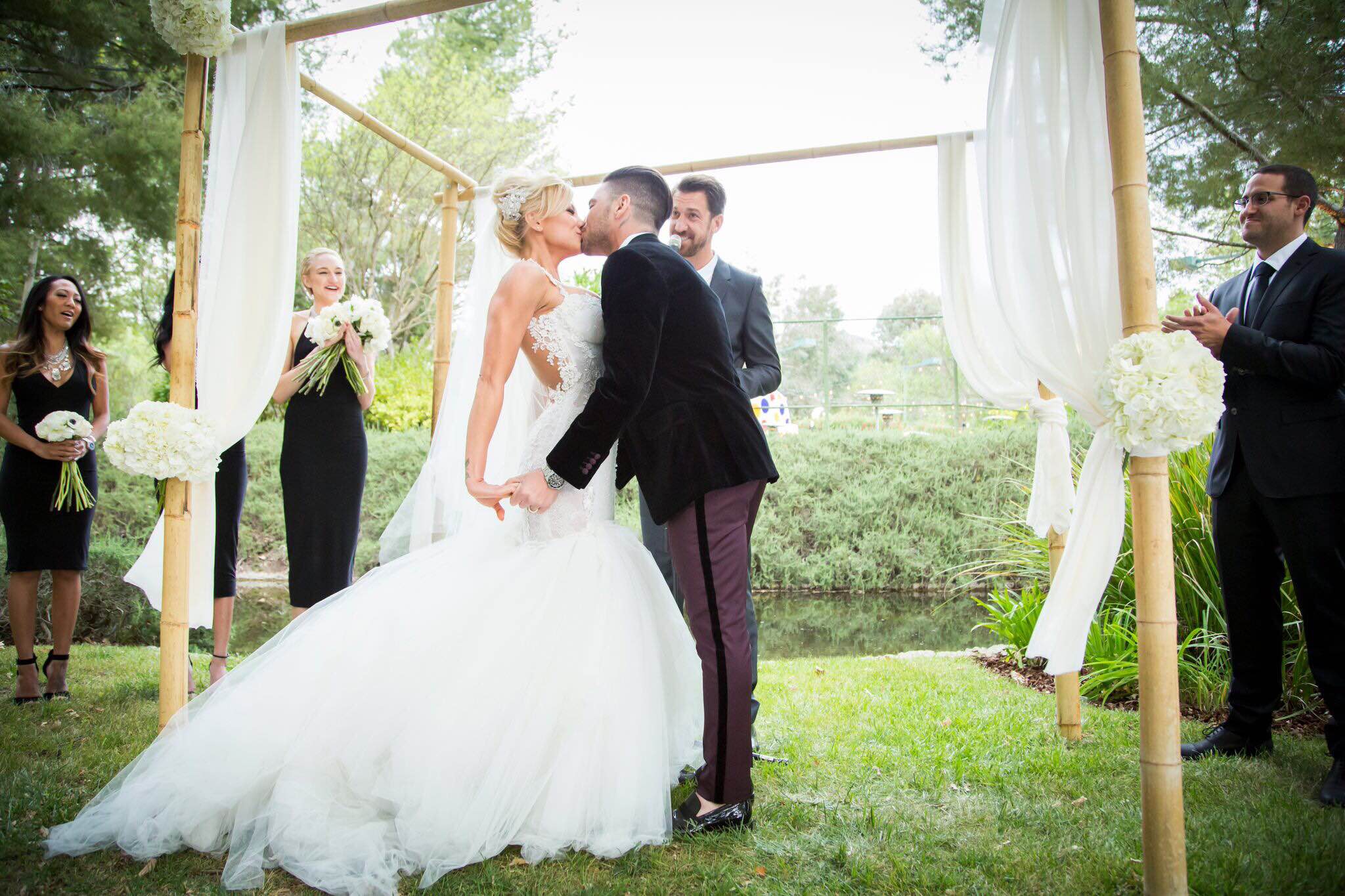 Abbi Cooperman in Galia Lahav Suzanne with her husband 