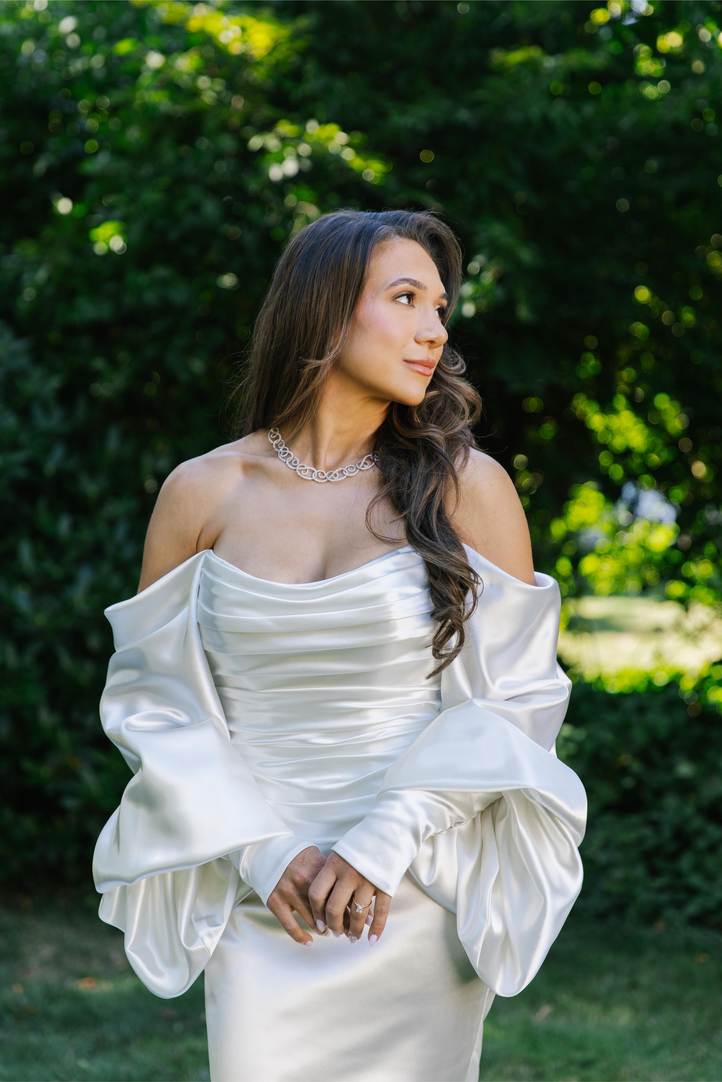 GL Bride Alexandra in Galia Lahav's Alona   standing outdoors with greenery in the background