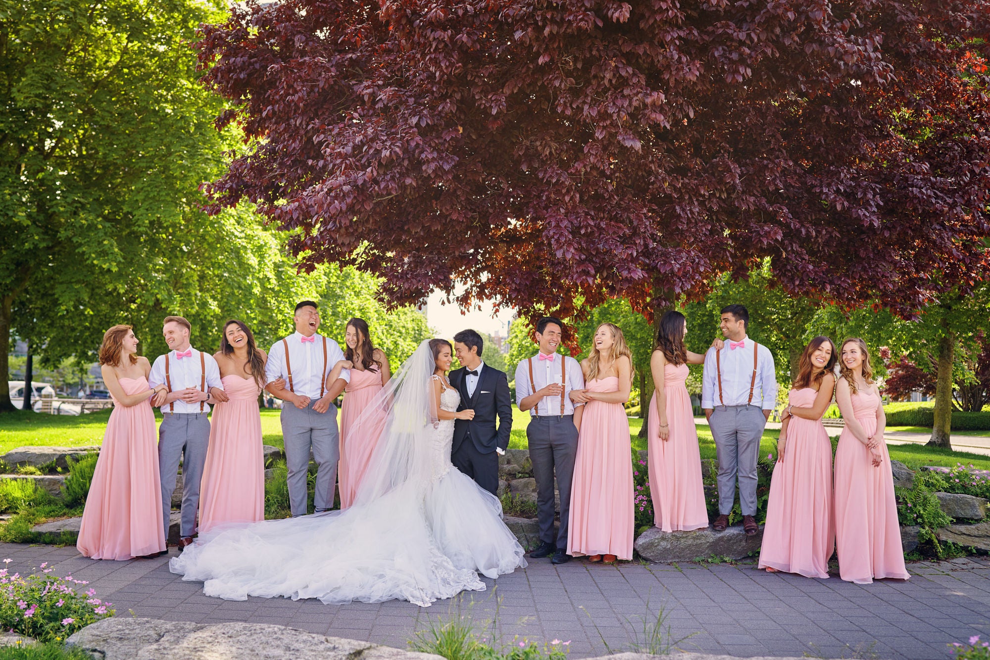 GL Bride Anita wearing our Ms. Elle with her husband and wedding party