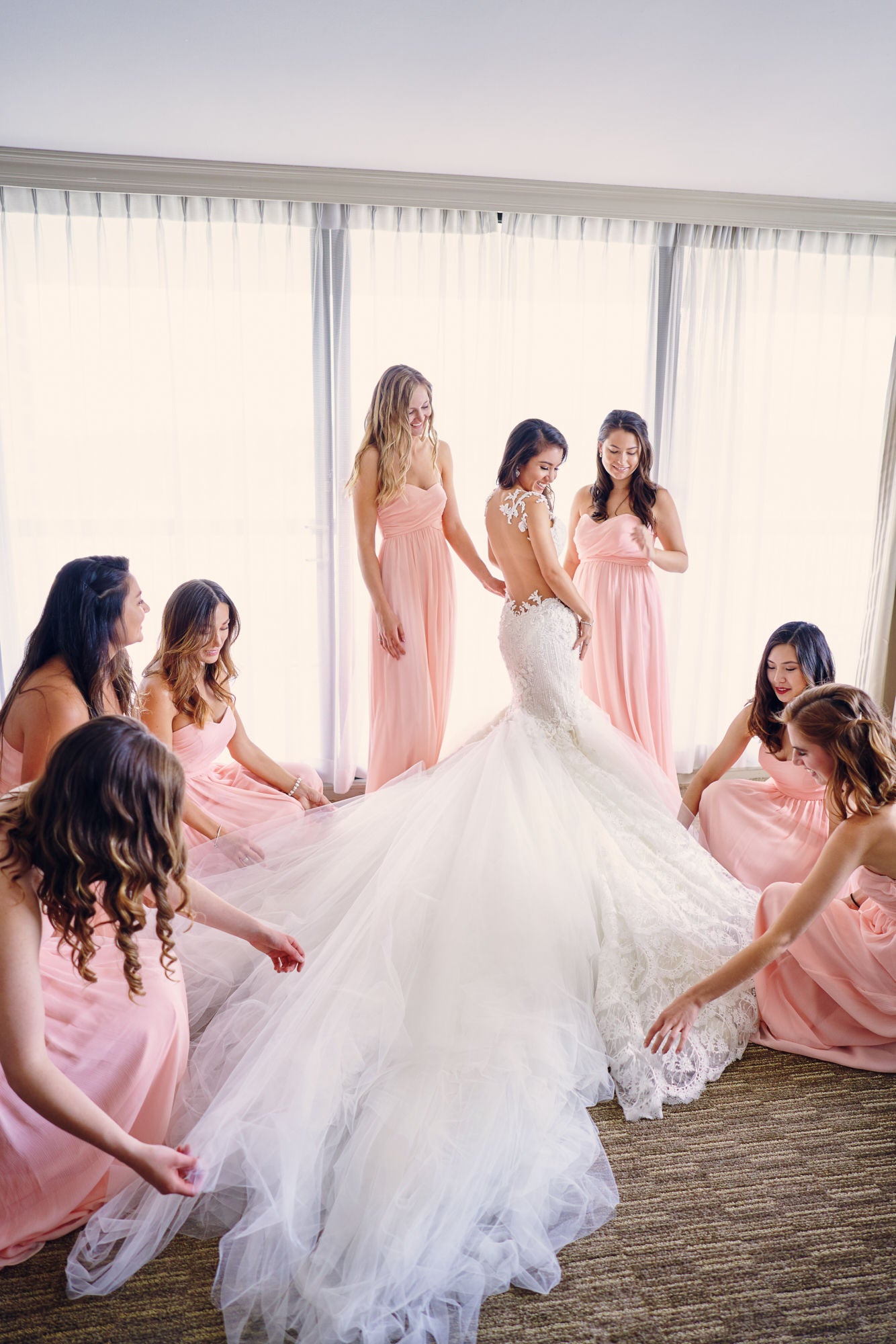 GL Bride Anita wearing the Tony surrounded by her bridesmaids 