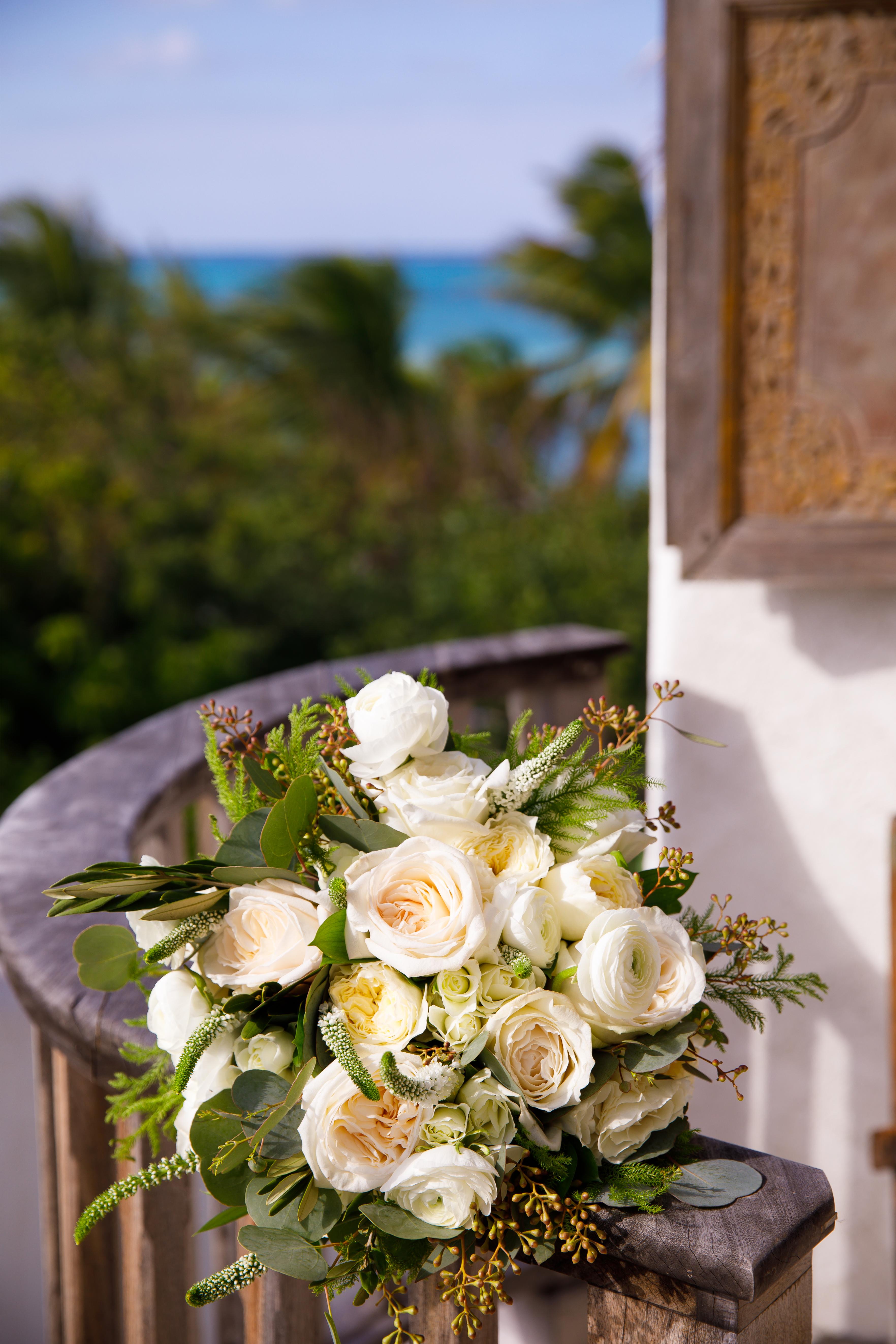 Bride's floral bouquet on a balcony