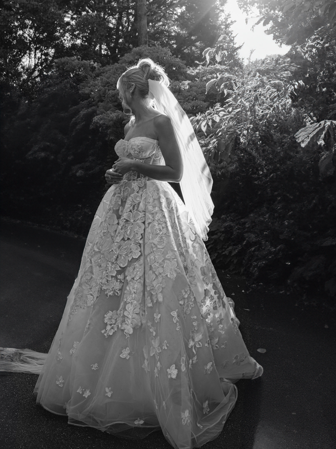 GL Bride Of The Week Emily wearing our Renee gown in a garden