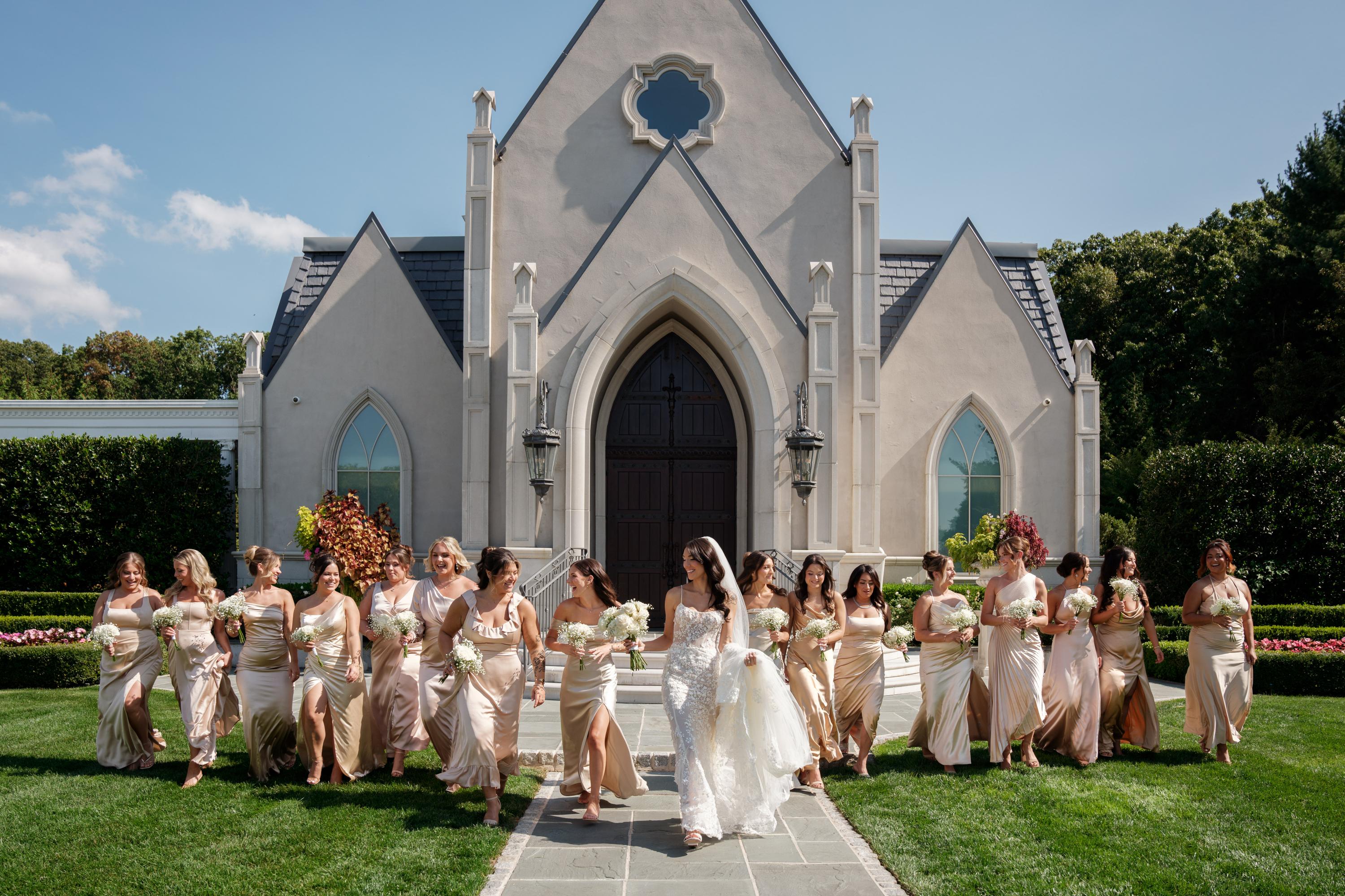 GL Bride Jessica wearing Galia Lahav Catalina gown with her bridesmaids standing in front of a church