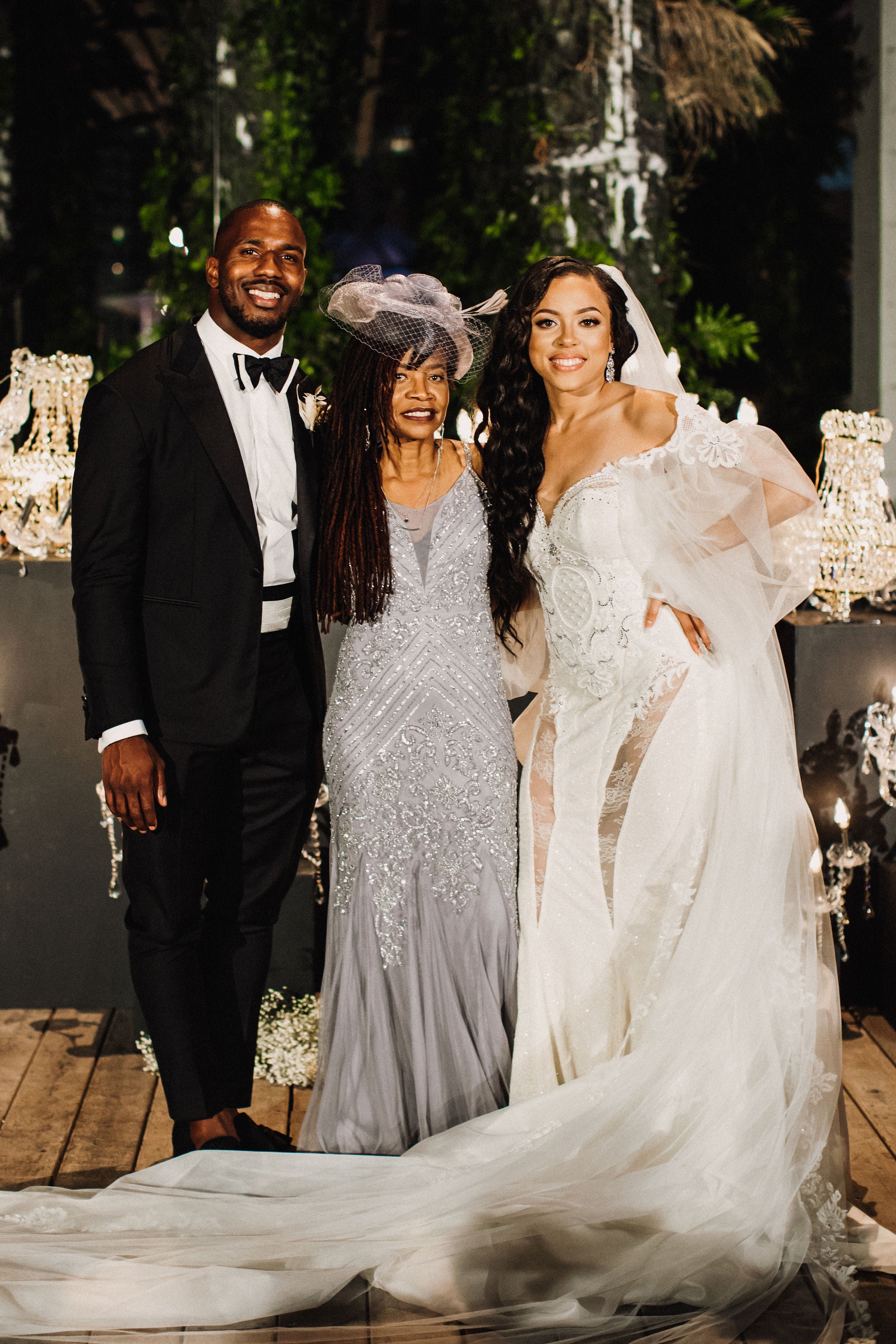 GL Bride Jessica in our Thelma gown with her groom and family