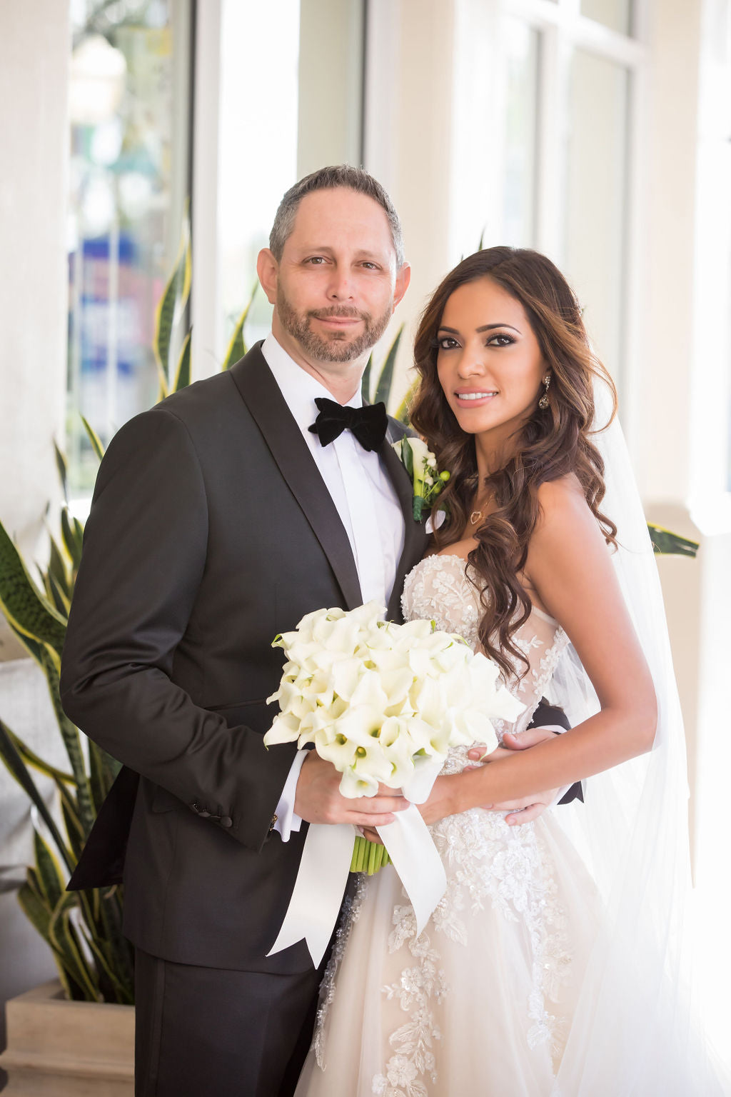 GL Bride Sam in our Gia Gown with her husband 