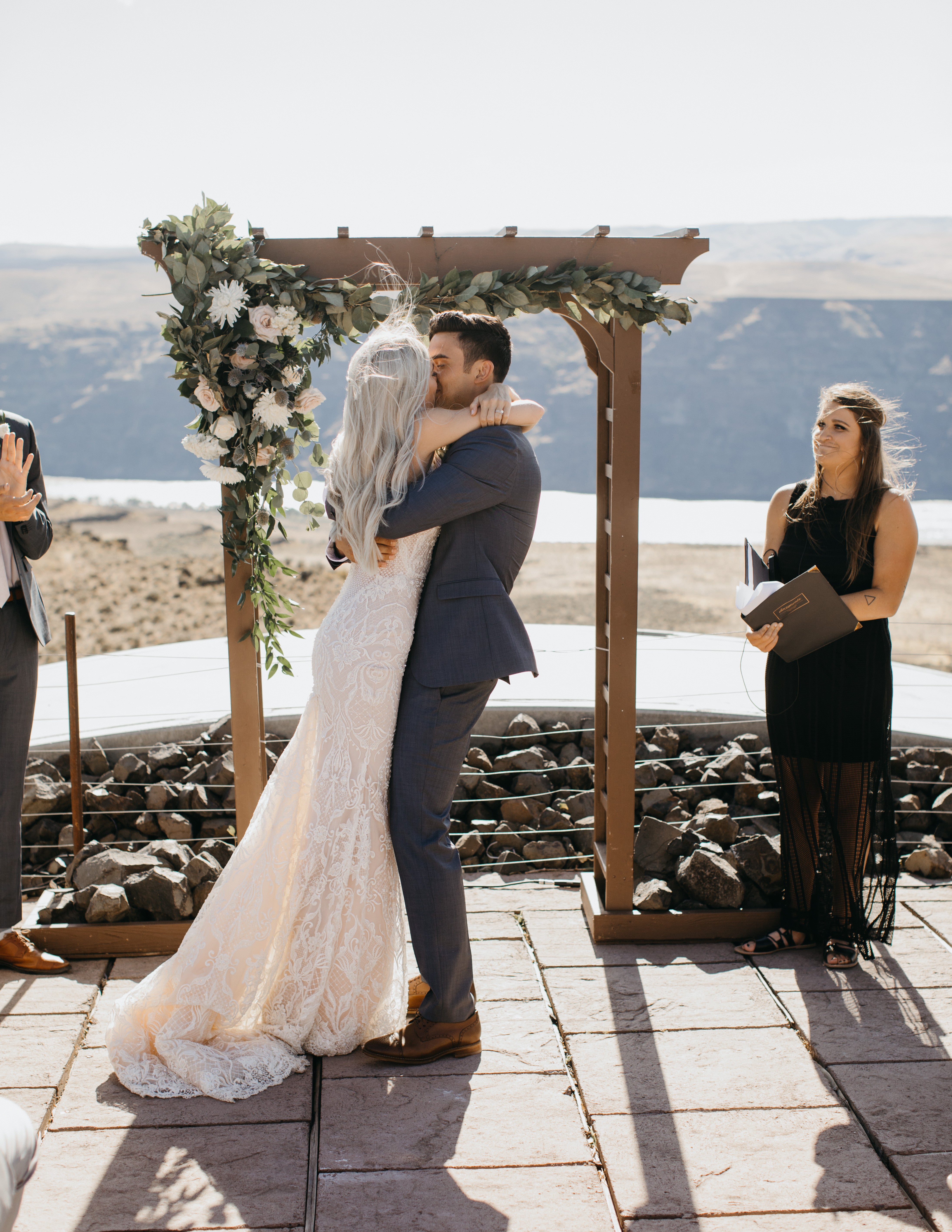 GL Bride Of The Week Taina in our GALA 708 at the altar with her husband 
