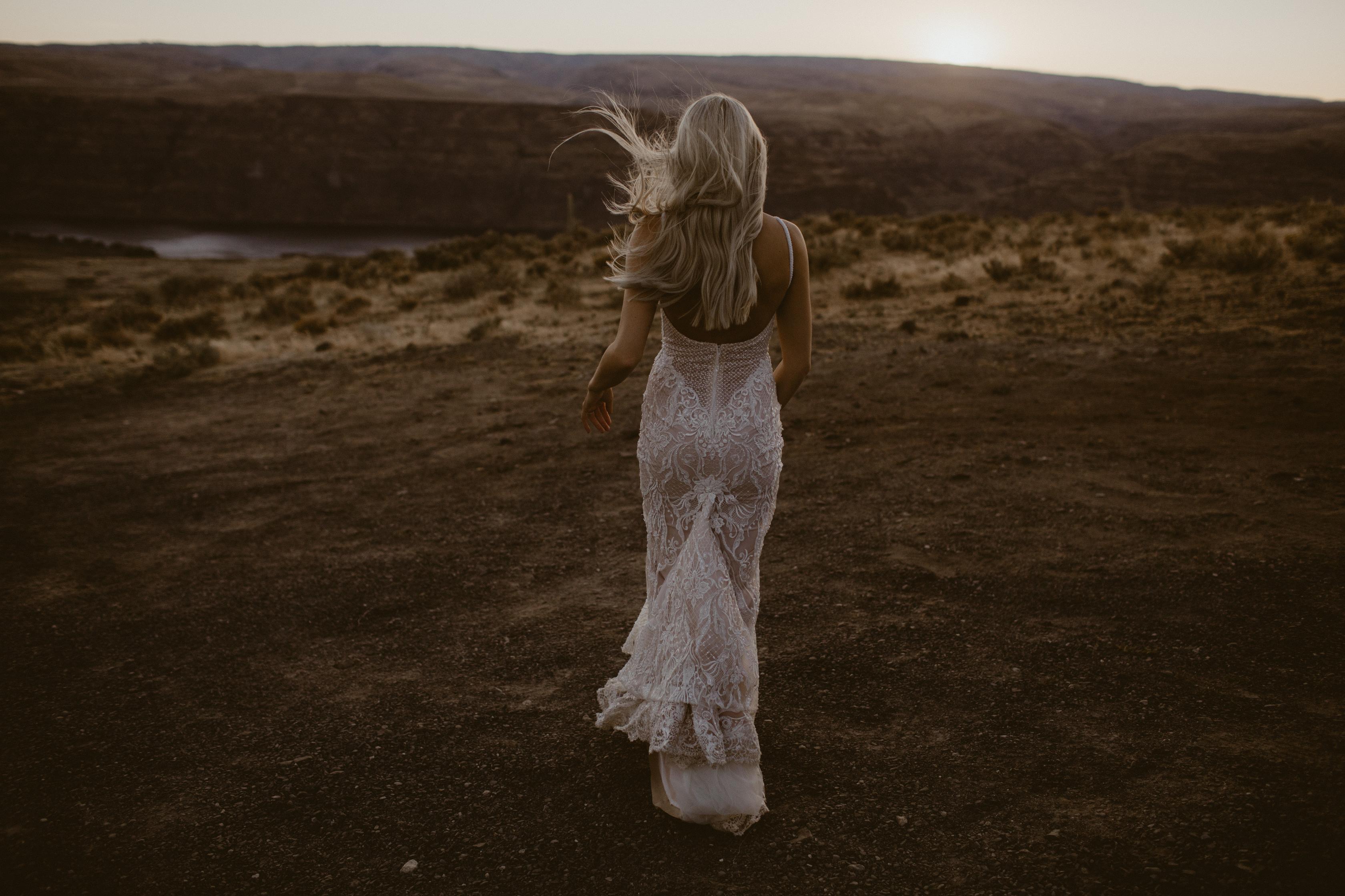 GL Bride Taina wearing our GALA 708 in an open field 