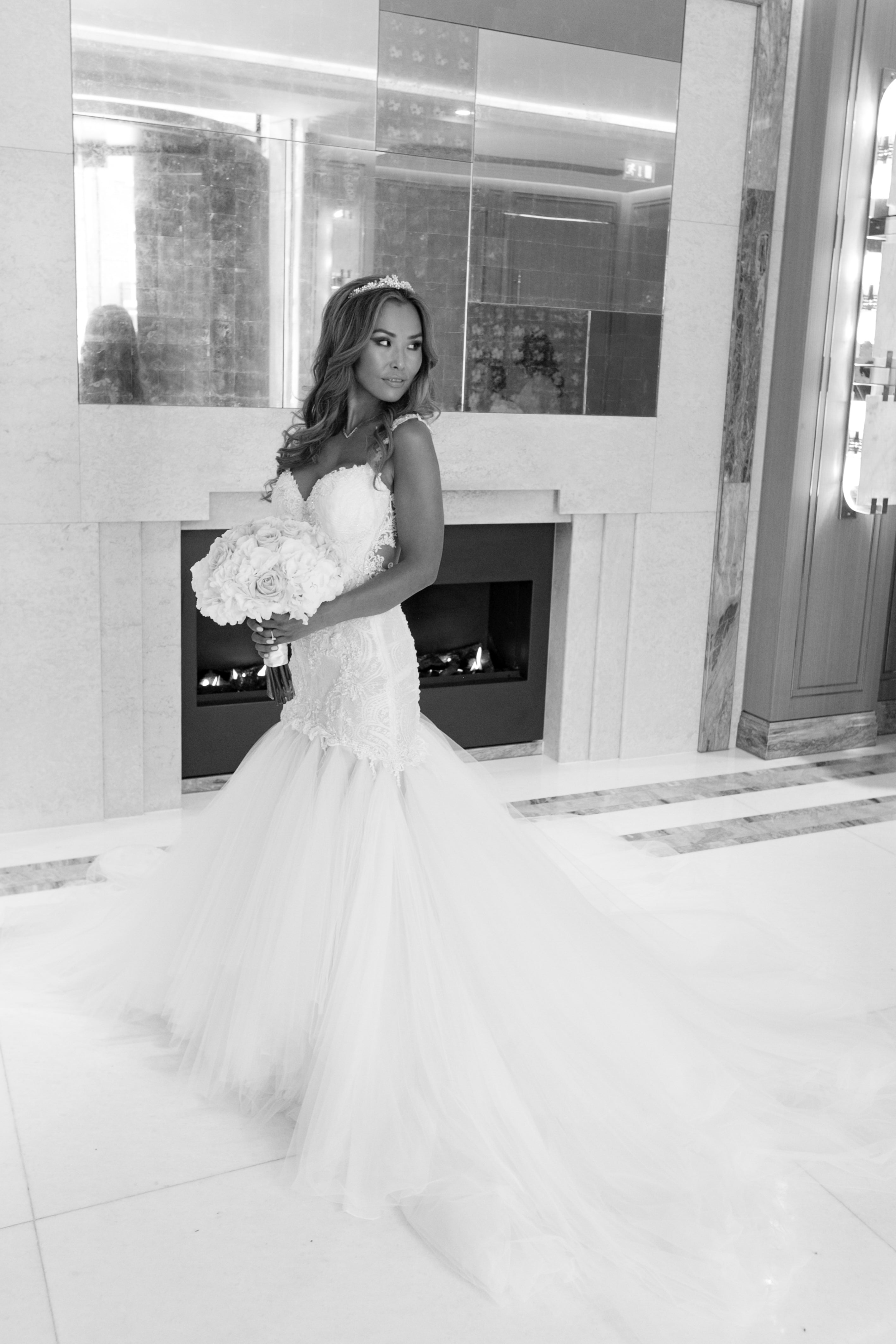 GL Bride Emma wearing the Loretta holding her bouquet 