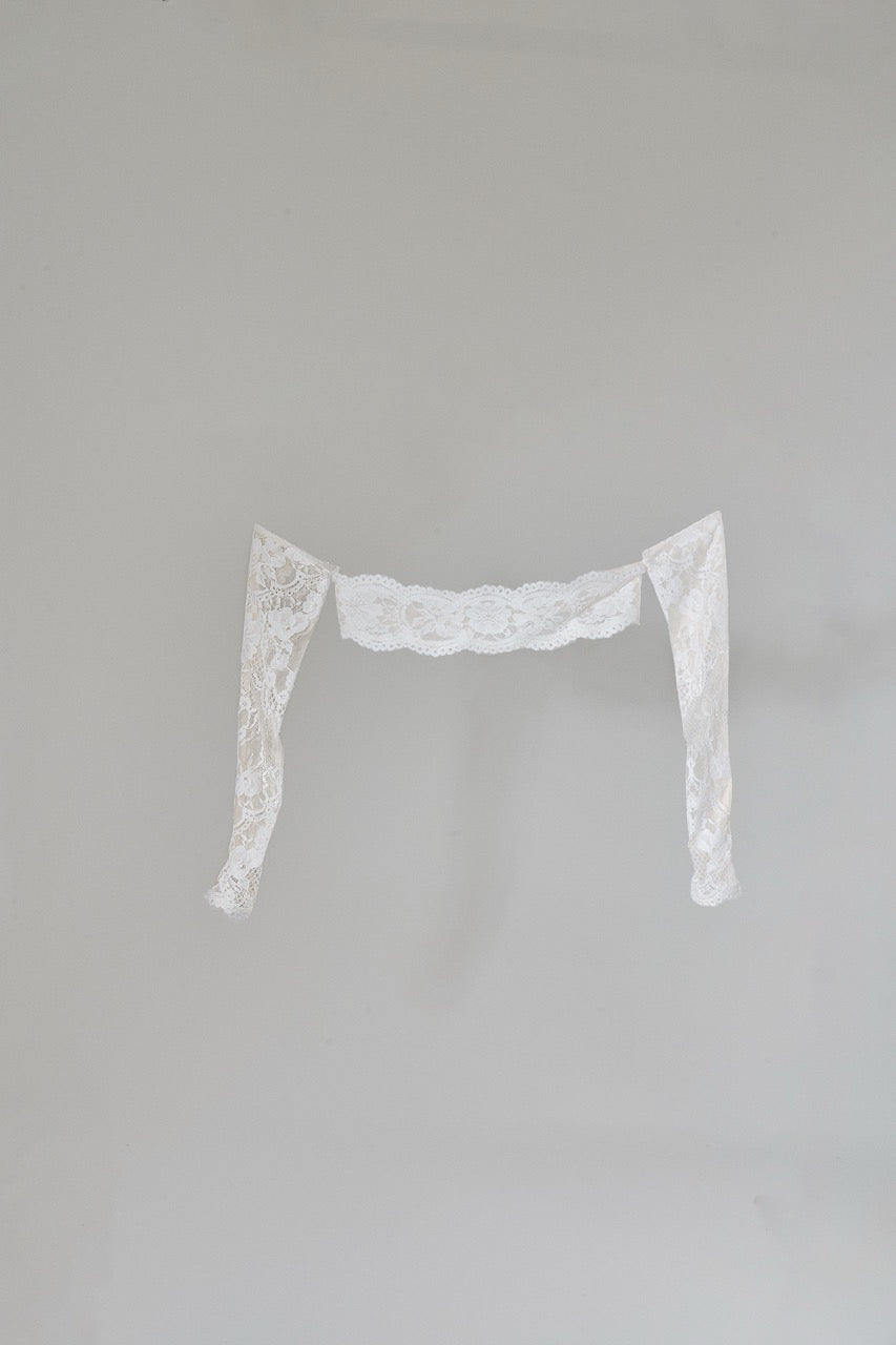 Lace trim on a gray background
