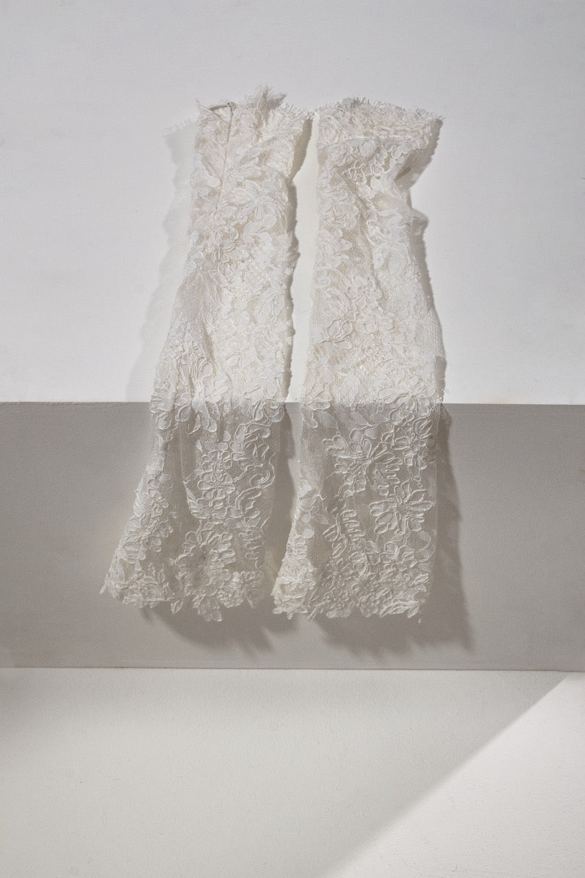 White lace dress on a white background